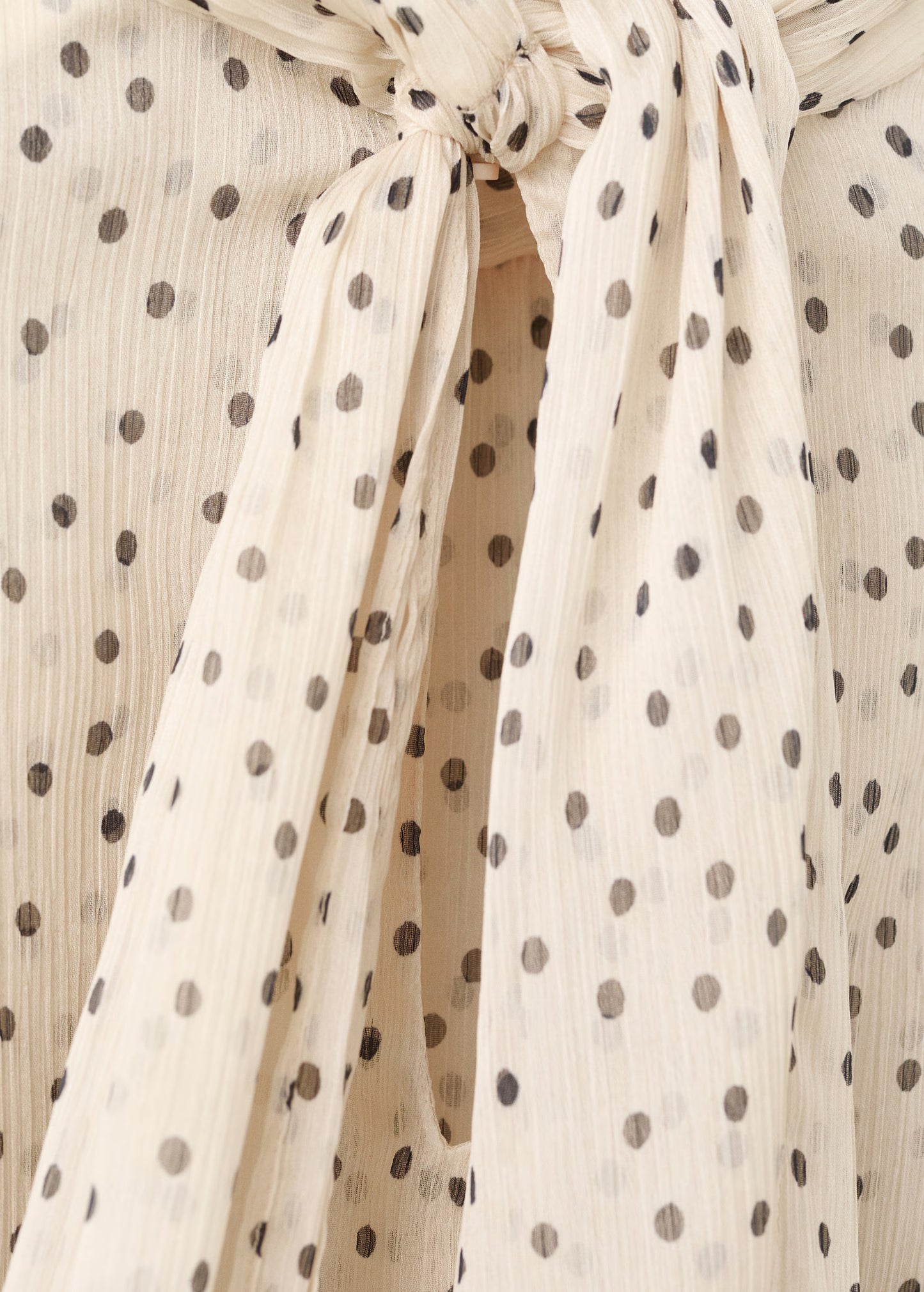 Bow polka-dot blouse