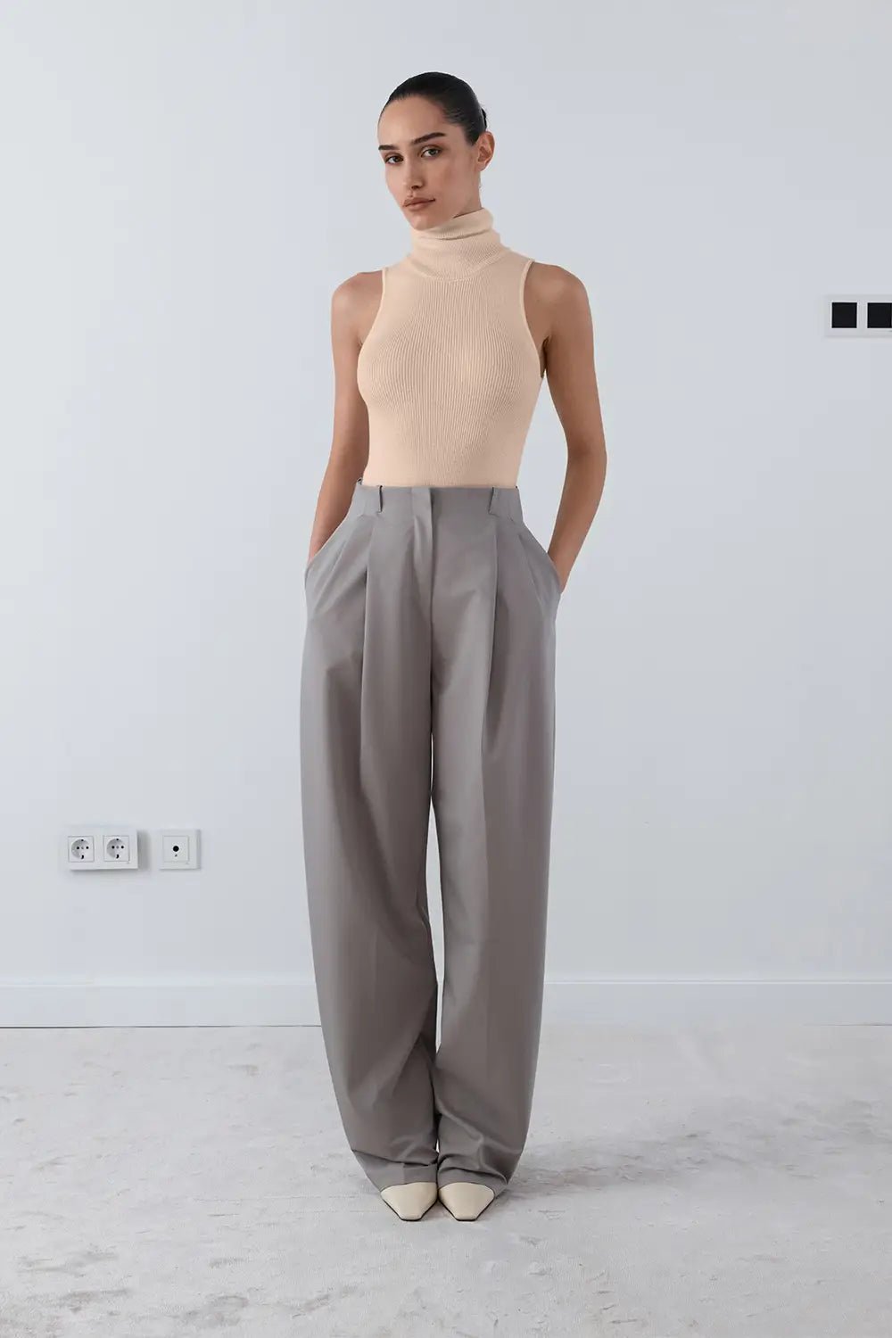 KNITTED BODYSUIT WITH HIGH NECK