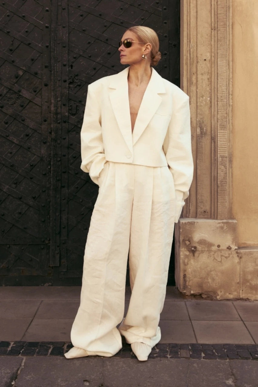 Cream-colored linen cropped jacket with gathered sleeves