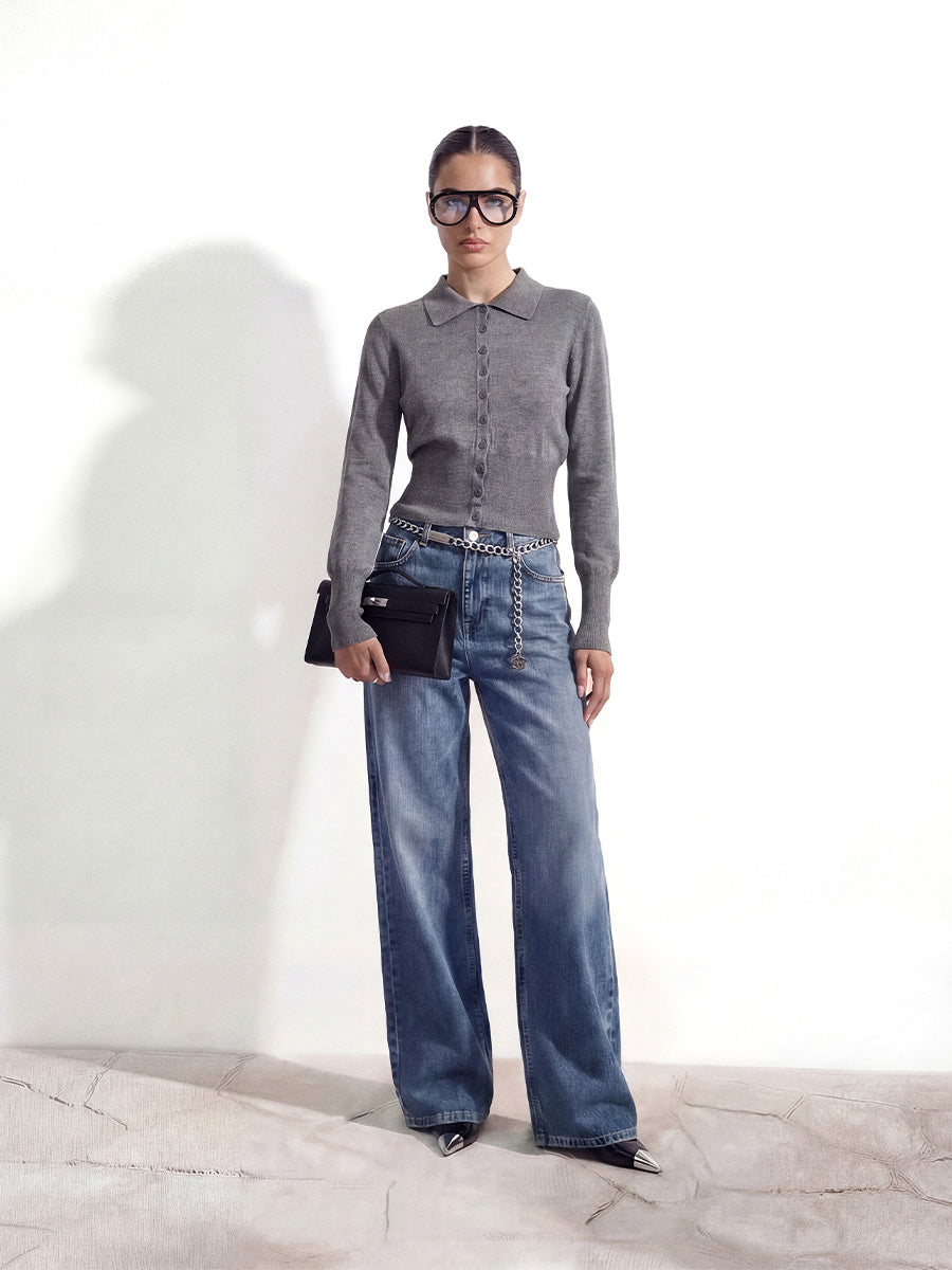 Dark gray button-front long-sleeve top with a wide ribbed waistband and cuffs.