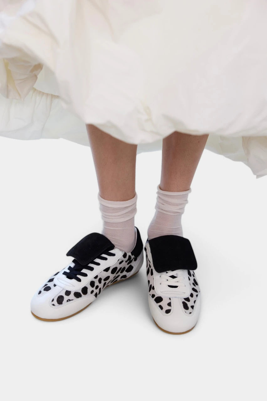 White Nostalgia sneakers with a cow print