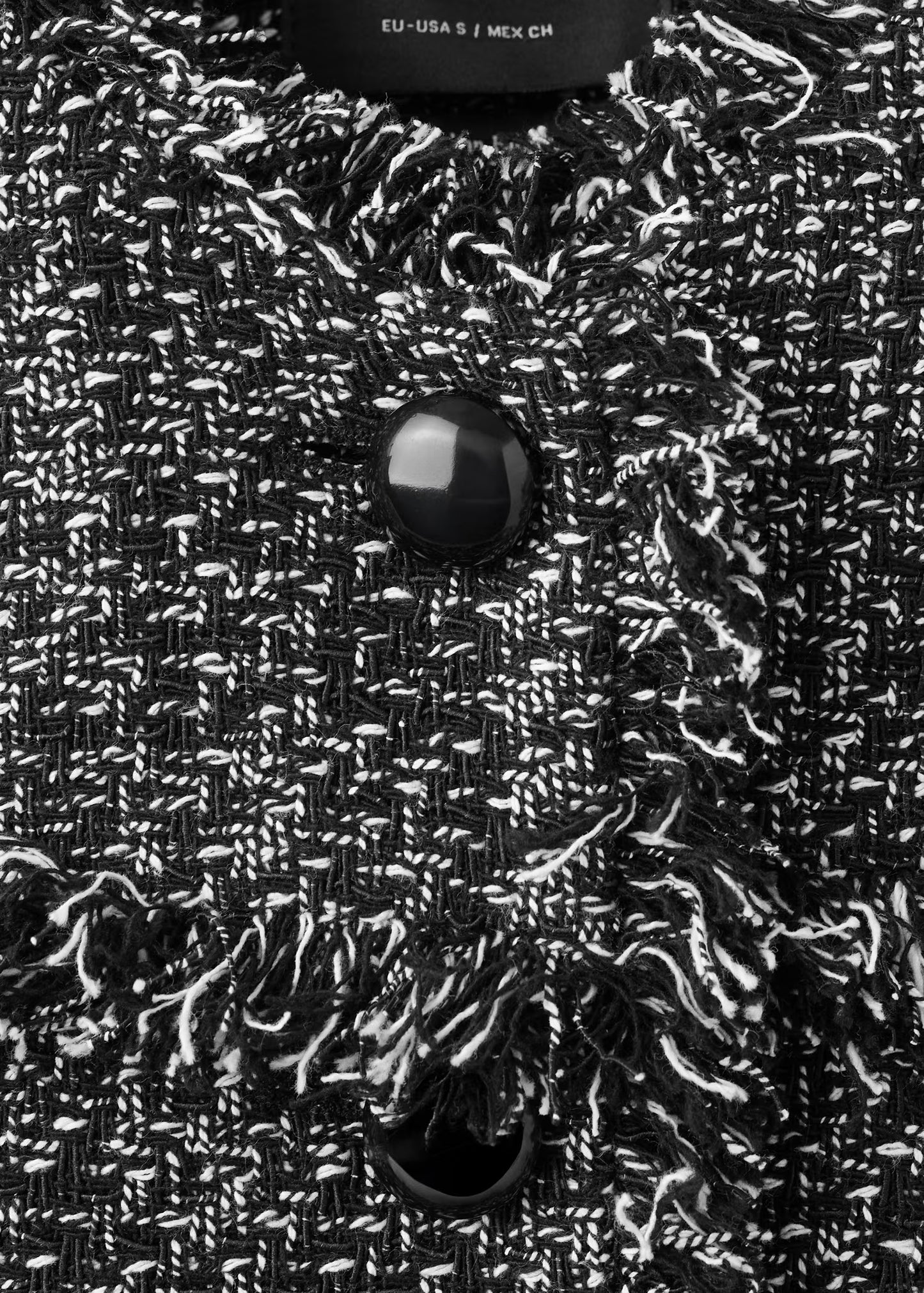 Tweed jacket with frayed ends