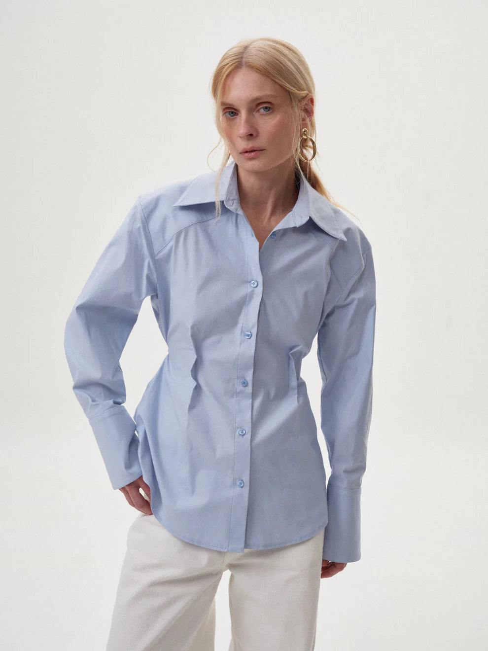 Blue shirt with an accent on the waist