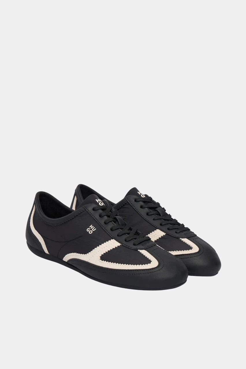 Black low-top sneakers