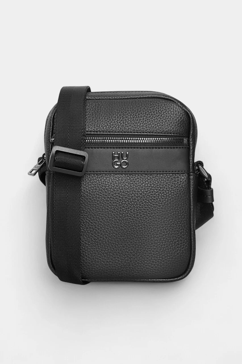 Black bag with a metal logo