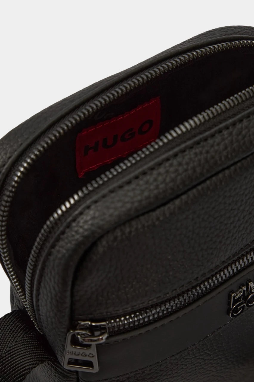 Black bag with a metal logo
