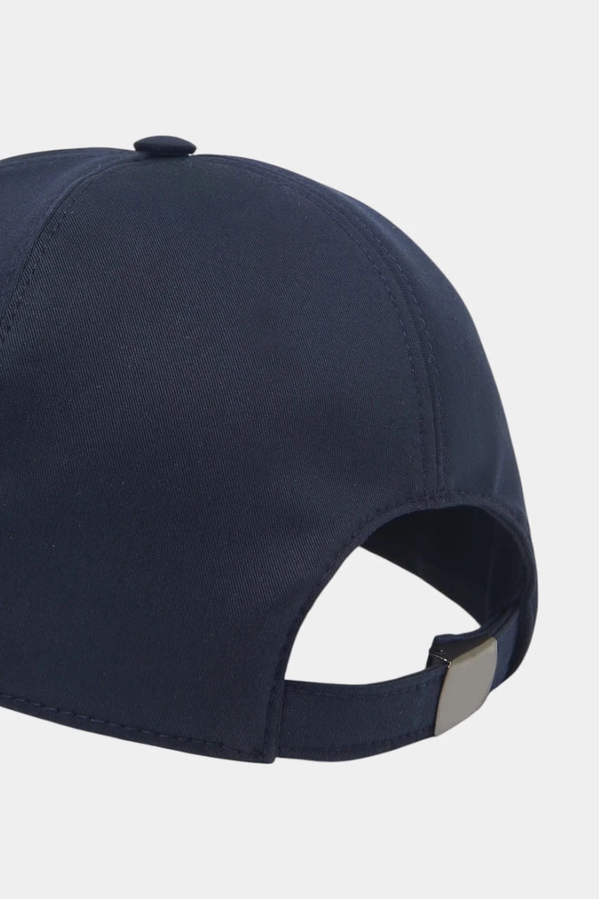 Dark blue cap with an embroidered logo